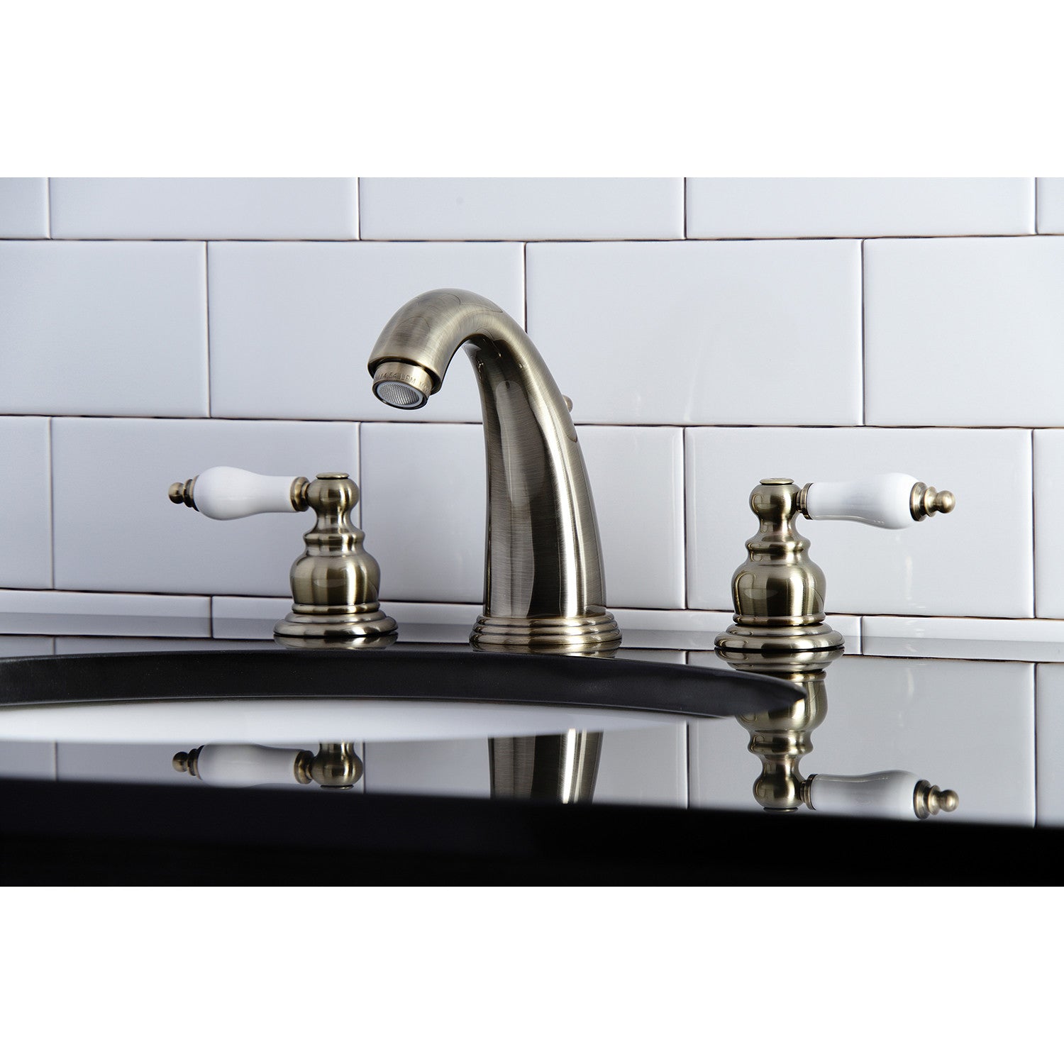 Kingston Heirloom KB983PLAB - Victorian Two-Handle 3-Hole Deck Mount Widespread Bathroom Faucet with Pop-Up Drain, Antique Brass — thumbnail 3